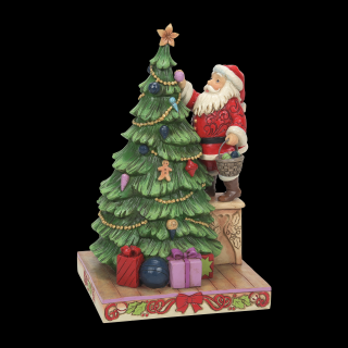 Mikołaj ubiera choinkę "idą święta" figurka artysty 6010819 Jim Shore figurka świąteczna Mikołaj prezent choinka