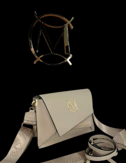 Asymetryczna torebka listonoszka Massimo Contti skórzana w kolorze beżowym